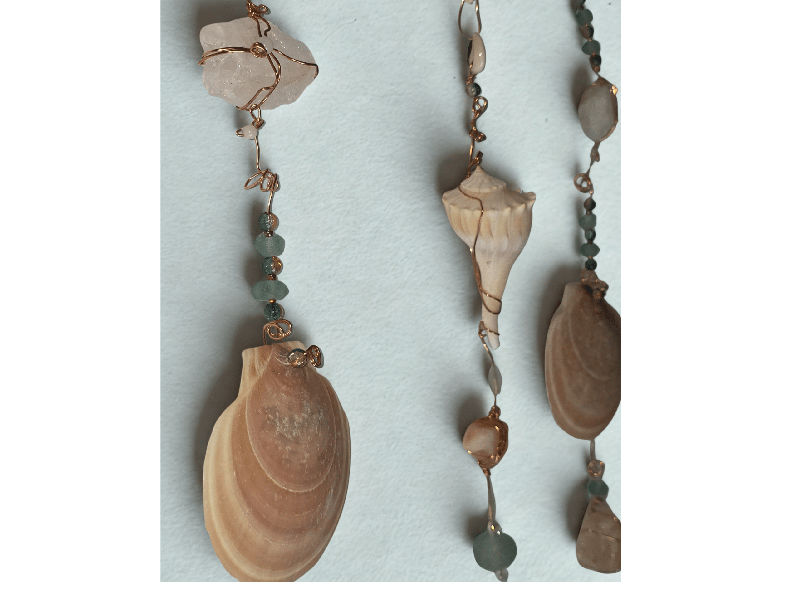 Handcrafted copper wire art detail showing artisan design made in St. Augustine Florida